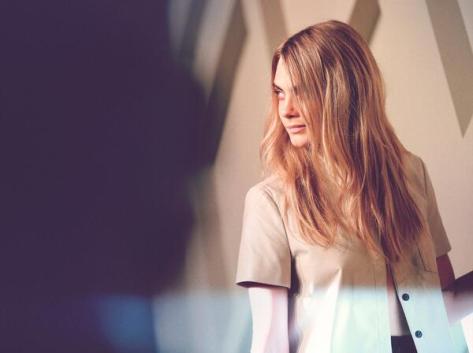 British model Cara Delevingne smiles for the cameras on the Burberry red carpet in Shanghai - Executive Salad